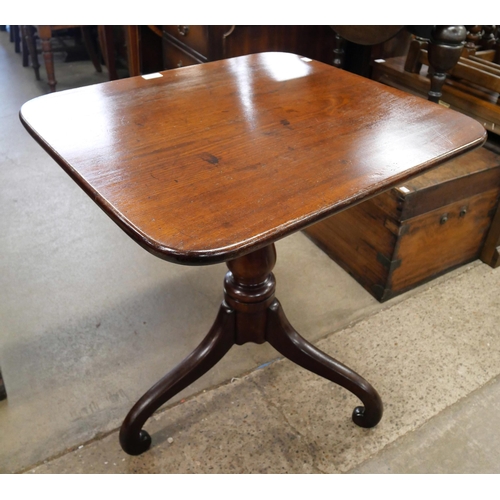 159 - A Victorian mahogany rectangular tilt top tripod tea table