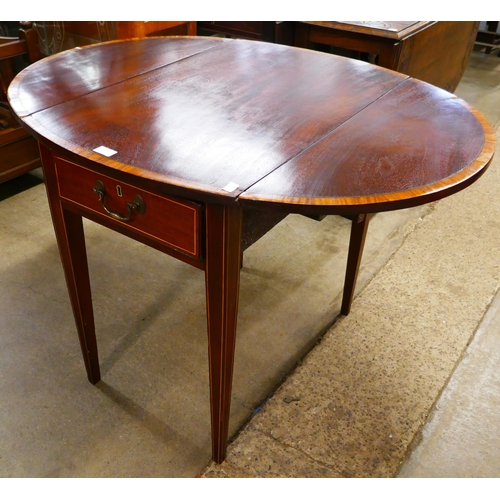 161 - A George III mahogany and satinwood crossbanded Pembroke table