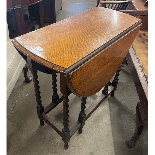 186 - An oak barleytwist gateleg table