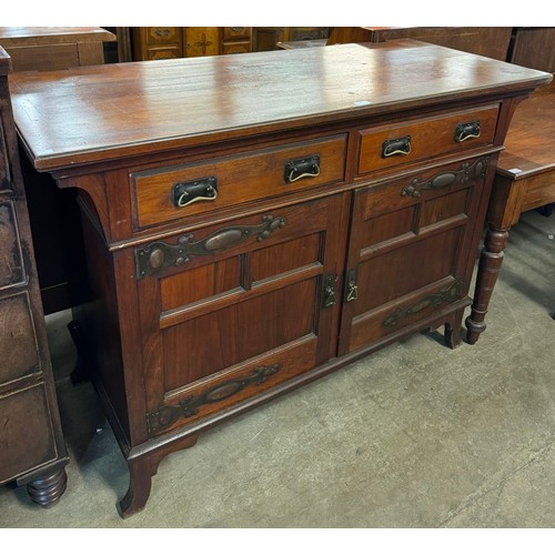 187 - An Arts and Crafts mahogany sideboard