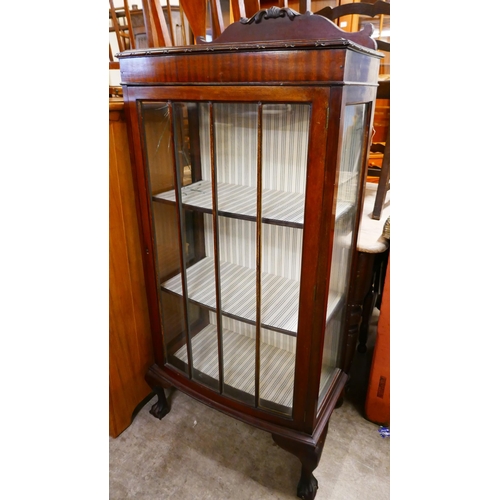 205 - An Edward VII mahogany single door bow front display cabinet