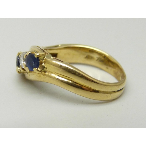 An 18ct gold, sapphire and diamond ring, 5g, L/M