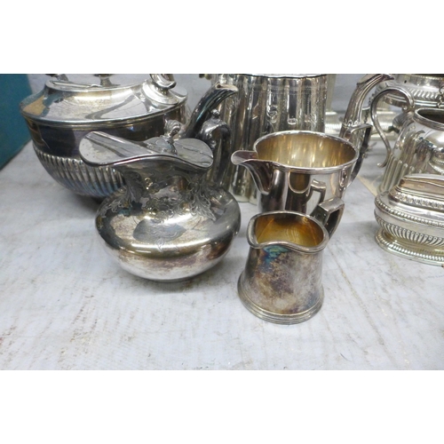 1154 - A collection of plated ware, etc., including a spirit kettle and candlesticks **PLEASE NOTE THIS LOT... 