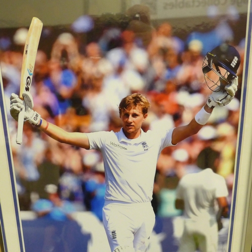 606 - A Joe Root signed display with miniature cricket bat, framed