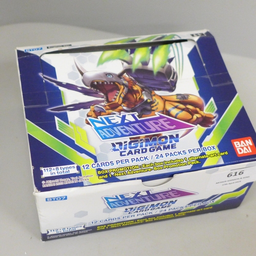 616 - A collection of Digimon cards, with box