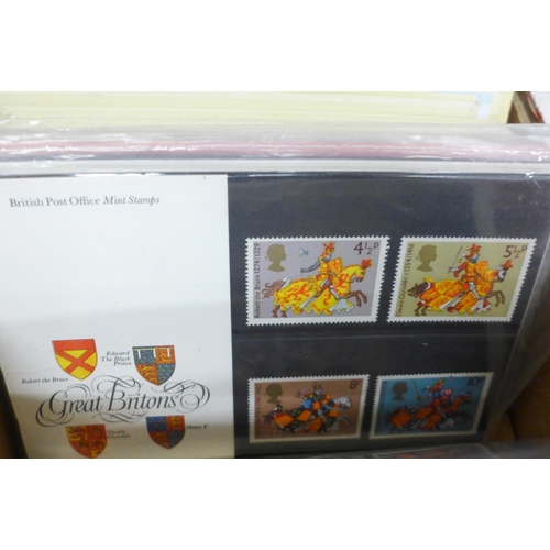 665 - Stamps; a box of GB stamps, covers, presentation packs, etc.