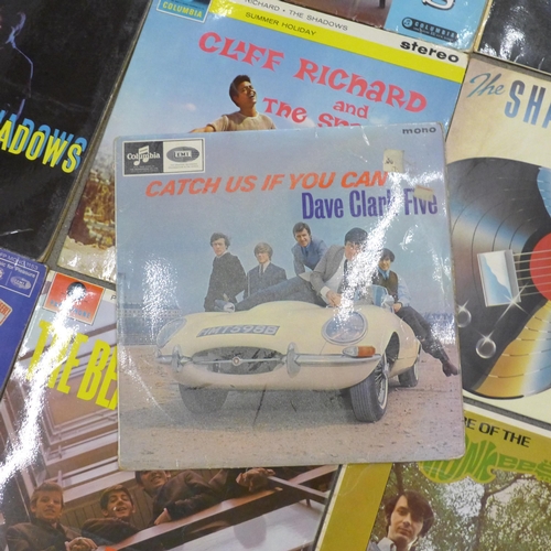 668 - Two The Beatles Please Please Me LP records and other records including The Shadows, Buddy Holly, et... 