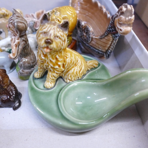 669 - A collection of Wade whimsies, Viking boat, pipe stand, etc.