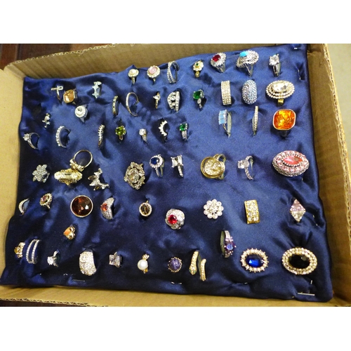 670 - A collection of sixty dress rings