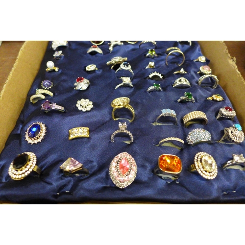 670 - A collection of sixty dress rings