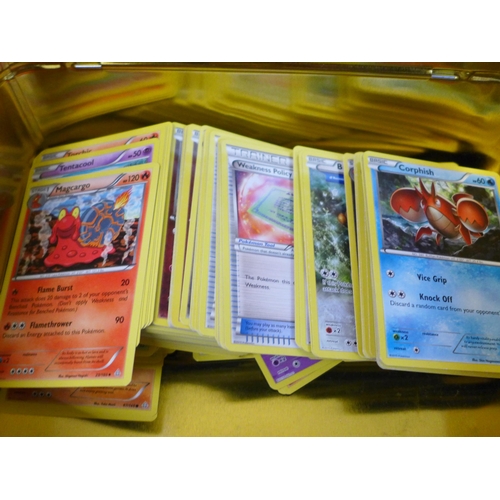 682 - A large quantity of Pokemon cards in collectors tins