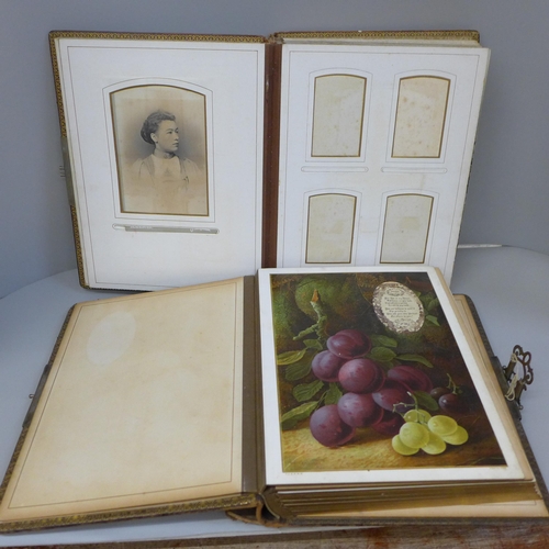 685 - Two Victorian photograph albums with coloured mounts, some cabinet cards and CDVs