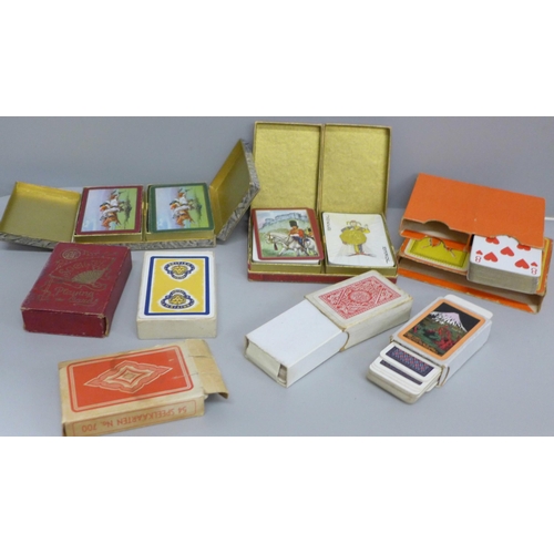 696 - A collection of vintage playing cards