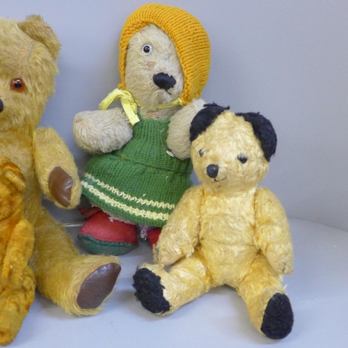 743 - Seven vintage Teddy bears including one musical