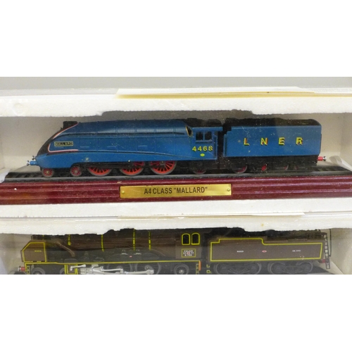 747 - Three plastic display model locomotives; an A4 Class Mallard, Pacific Chapelon Nord and Duchess LMS