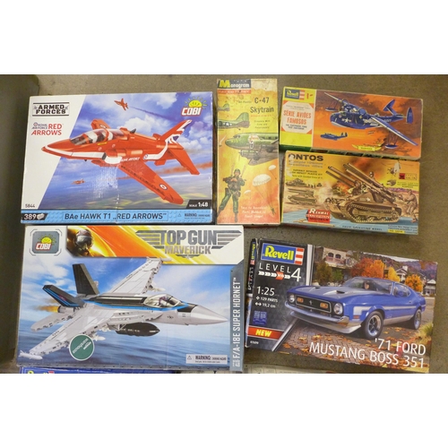 759 - A collection of model aircraft and motor car kits, Revell, Airfix, and Monogram, etc.