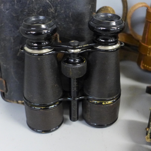 764 - Three cased sets of field glasses and a pocket Zonex telescope