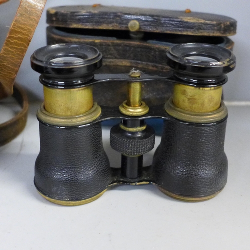 764 - Three cased sets of field glasses and a pocket Zonex telescope