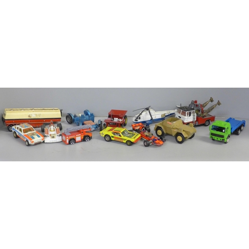 765 - A collection of Dinky, Corgi and Matchbox vehicles, playworn