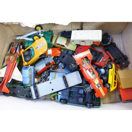 765 - A collection of Dinky, Corgi and Matchbox vehicles, playworn