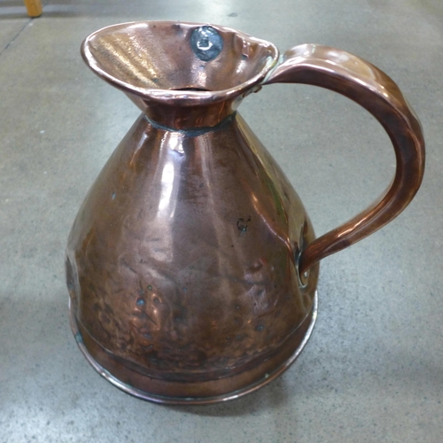 770 - A copper flagon, Imperial 1 gallon and a smaller copper flagon and a copper warming pan