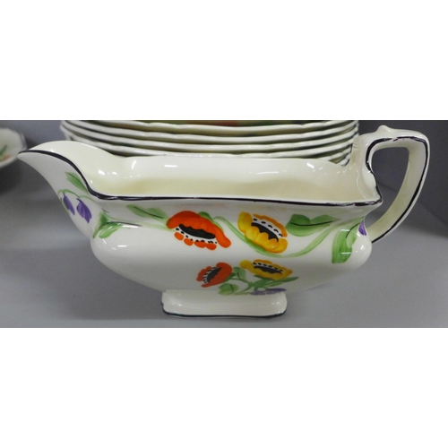 774 - A hand painted Hancocks Ivory ware dinner service; soup dish, gravy boat, plates, side plates, etc. ... 