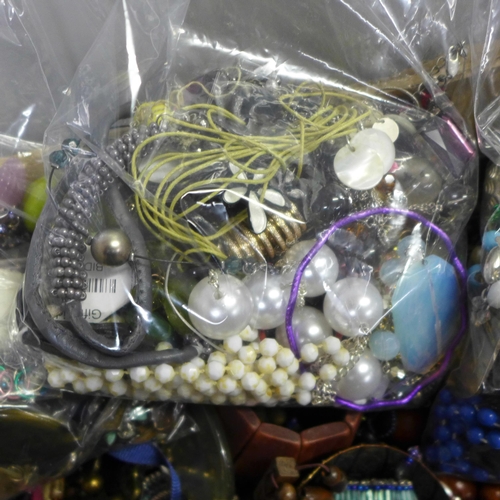 784 - A large box of costume jewellery and three bags