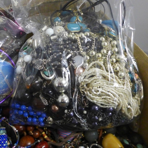 784 - A large box of costume jewellery and three bags