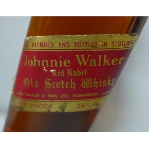 788 - A bottle of Johnnie Walker Red Label Old Scotch Whisky, SB994S16 UCB raised backstamp (in vendor's f... 