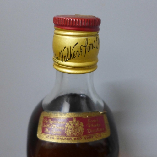 788 - A bottle of Johnnie Walker Red Label Old Scotch Whisky, SB994S16 UCB raised backstamp (in vendor's f... 