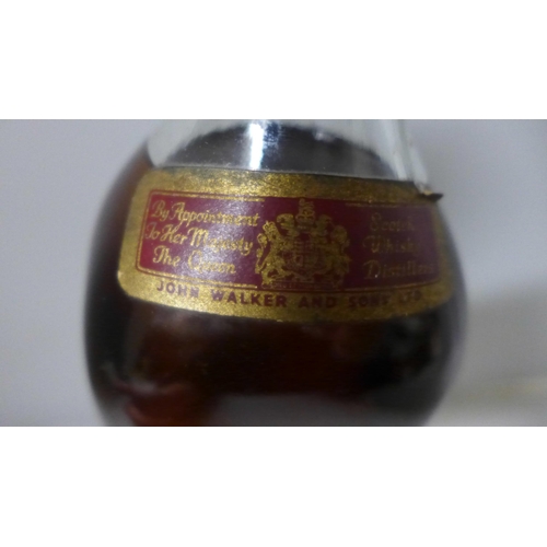 788 - A bottle of Johnnie Walker Red Label Old Scotch Whisky, SB994S16 UCB raised backstamp (in vendor's f... 