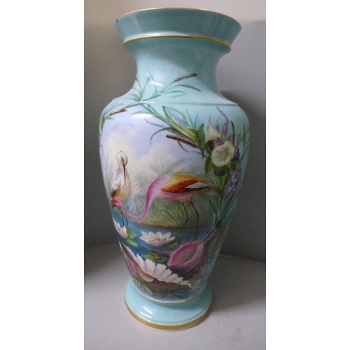 799 - Three hand painted opaline glass vases and one large 19th Century blue glass vase decorated with fla... 