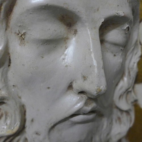 803 - A plaster wall plaque of Jesus Christ, 41cm wide.