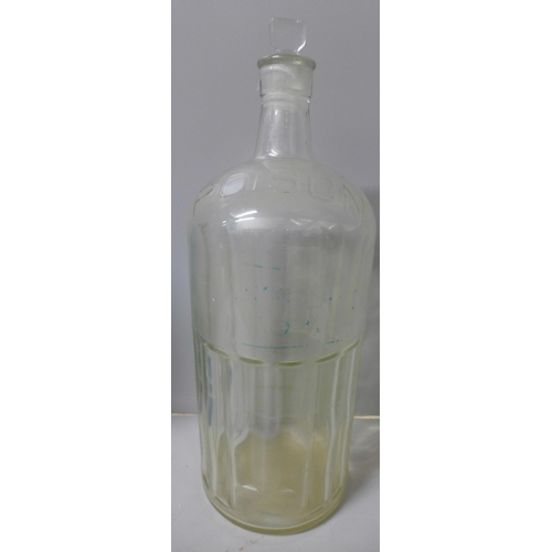 807 - A large clear glass poison jar, 35.5cm and a Davidson blue glass vase