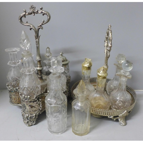 812 - Two plated cruet sets, one six bottle with missing glass bottle and an ornate six bottle cruet set w... 