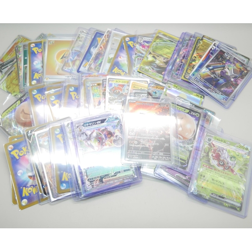 828 - A collection of approximately 95 Pokemon cards