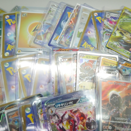 828 - A collection of approximately 95 Pokemon cards