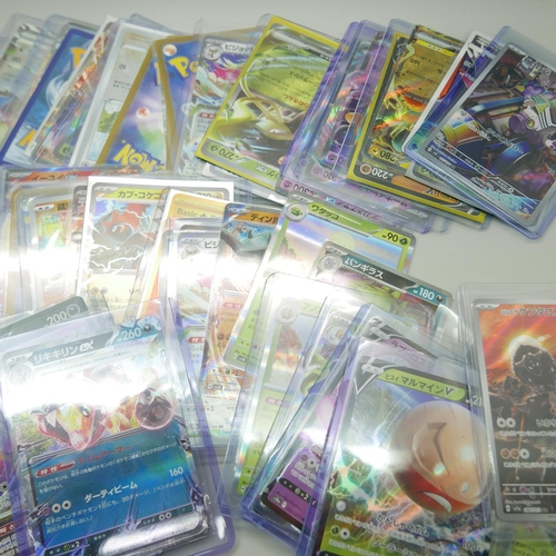 828 - A collection of approximately 95 Pokemon cards