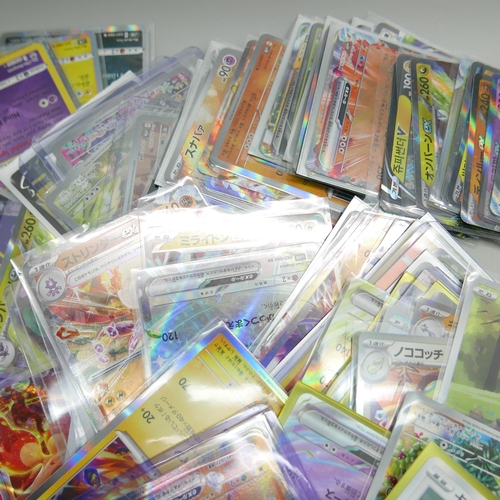 829 - A collection of approximately 120 Pokemon cards