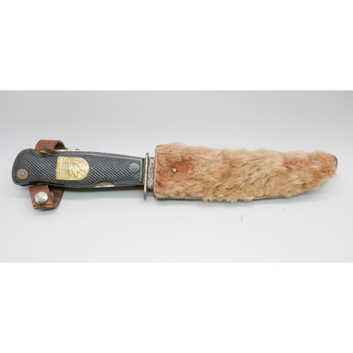 834 - A German Decora, Solingen hunting knife with multitools in hilt, in leather sheath