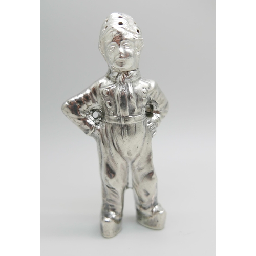 847 - A novelty continental silver pepper modelled as a young Dutch boy, marked HH, possibly Herbert Hooij... 