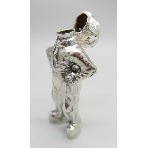 847 - A novelty continental silver pepper modelled as a young Dutch boy, marked HH, possibly Herbert Hooij... 