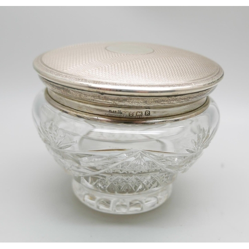 849 - A silver topped cut glass jar, lid 42g, diameter 92mm