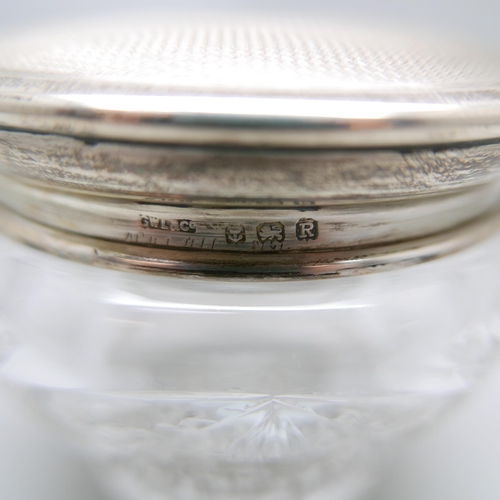 849 - A silver topped cut glass jar, lid 42g, diameter 92mm