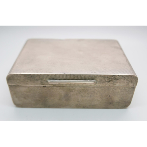 851 - A silver cigarette box, total weight with liner 382g, 13.5cm wide