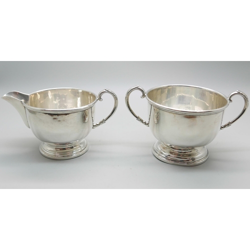 854 - A silver cream and sugar, 193g