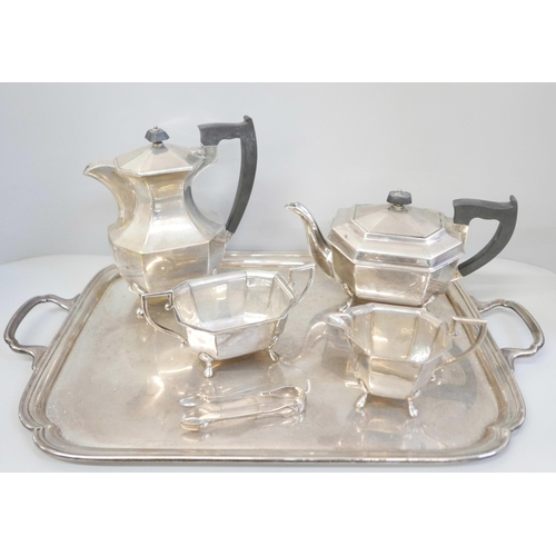 858 - A silver four piece tea service, two handled tray and a pair of silver sugar bows, Sheffield 1945 an...