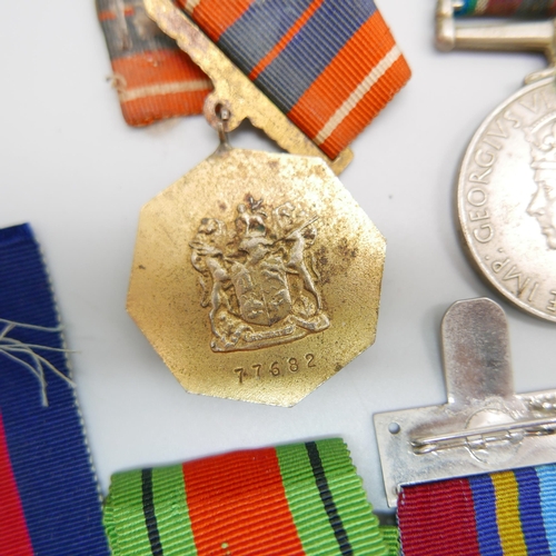 863 - Eight medals, including two Africa Service Medals to 592810 D.T. Howells and 133965 C.W. Chapman