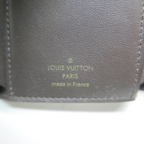 866 - A lady's Louis Vuitton purse, boxed