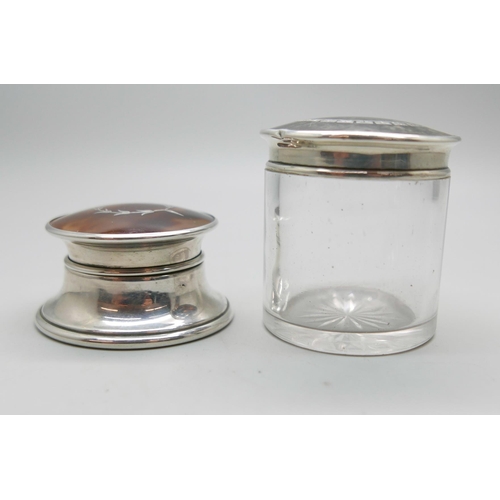 868 - Two silver and tortoiseshell topped jars/pots, (glass jar 5cm)